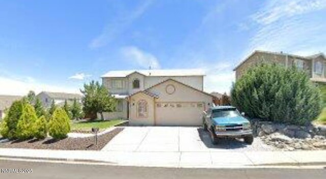 8510 Coral Reef Dr, Reno, NV 89506 - view of front facade with an attached garage and driveway