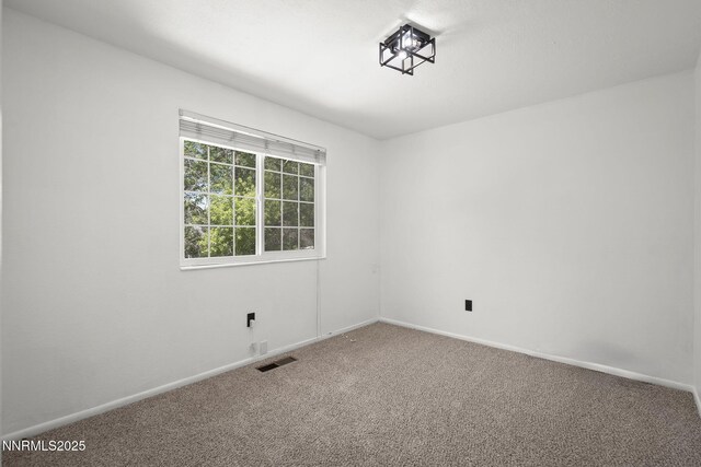 2125 Woodhaven Ln, Sparks, NV 89434 - carpeted spare room featuring baseboards