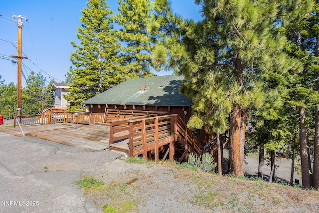 223 Ski Ct # B, Stateline, NV 89449 - view of front facade featuring a wooden deck and roof with shingles