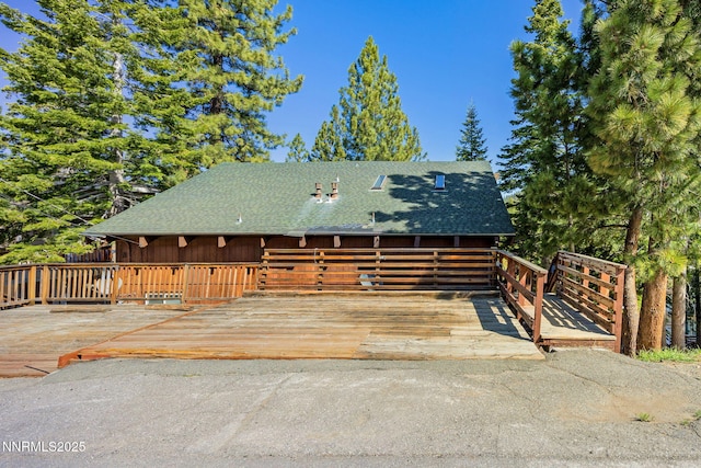 223 Ski Ct # B, Stateline, NV 89449 - view of front facade featuring a shingled roof and a deck