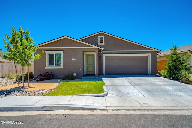 640 Mcgill Dr, Reno, NV 89506 - single story home featuring a garage, stucco siding, and concrete driveway