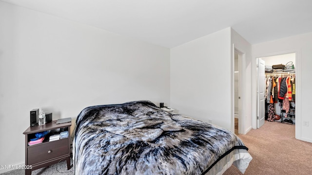 640 Mcgill Dr, Reno, NV 89506 - bedroom featuring light carpet, a spacious closet, baseboards, and a closet