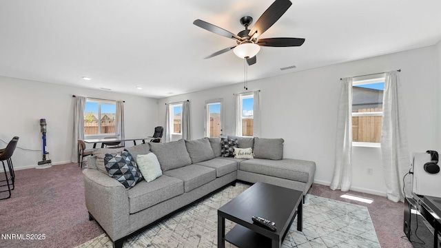 640 Mcgill Dr, Reno, NV 89506 - living area featuring light colored carpet, a ceiling fan, and baseboards