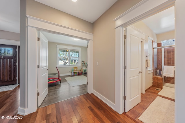 1011 Keystone Ct, Gardnerville, NV 89460 - corridor with wood finished floors and baseboards