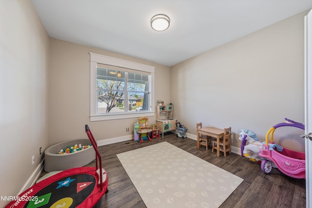 1011 Keystone Ct, Gardnerville, NV 89460 - recreation room featuring baseboards and wood finished floors