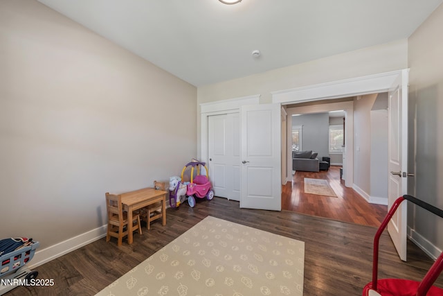 1011 Keystone Ct, Gardnerville, NV 89460 - game room with baseboards and wood finished floors