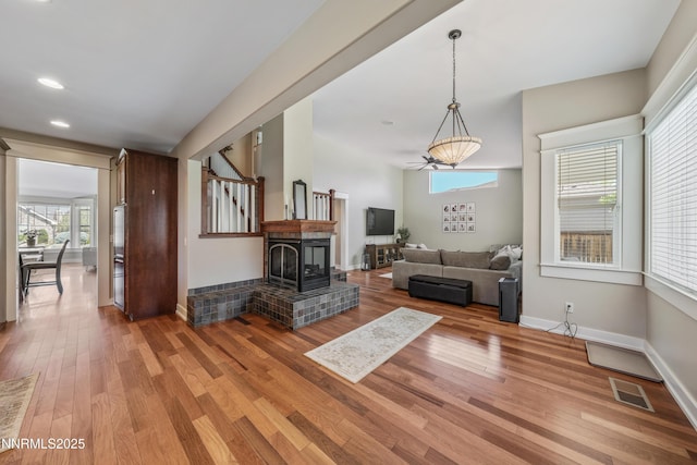 1011 Keystone Ct, Gardnerville, NV 89460 - living room featuring light wood-type flooring, baseboards, and recessed lighting