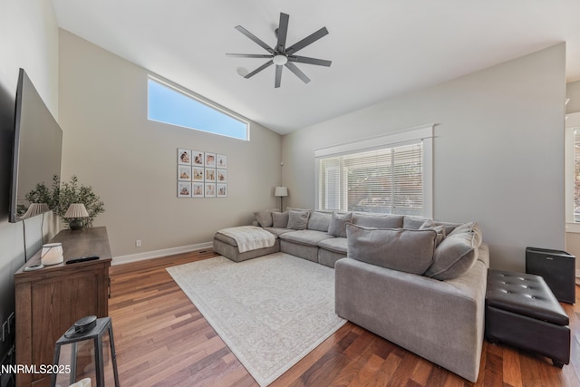 1011 Keystone Ct, Gardnerville, NV 89460 - living area featuring a ceiling fan, wood finished floors, baseboards, and high vaulted ceiling