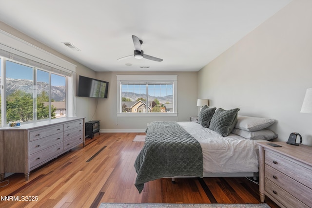 1011 Keystone Ct, Gardnerville, NV 89460 - bedroom featuring light wood finished floors, baseboards, and a ceiling fan