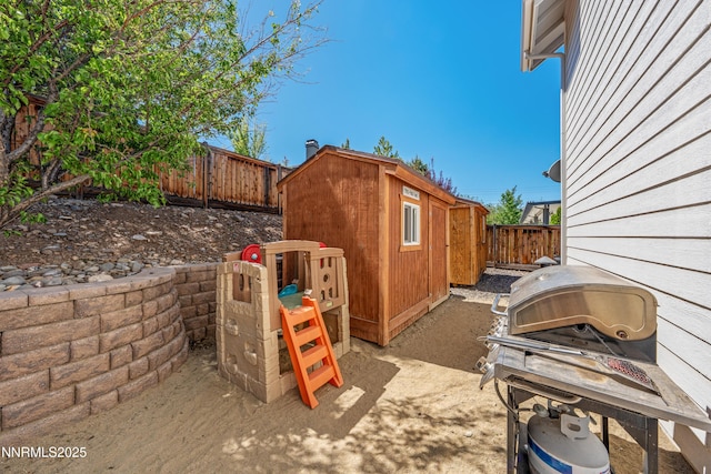1011 Keystone Ct, Gardnerville, NV 89460 - fenced backyard with area for grilling