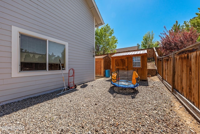 1011 Keystone Ct, Gardnerville, NV 89460 - fenced backyard featuring an outdoor structure