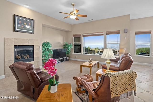 10168 Via Fiori, Reno, NV 89511 - living room with ceiling fan, baseboards, and a fireplace