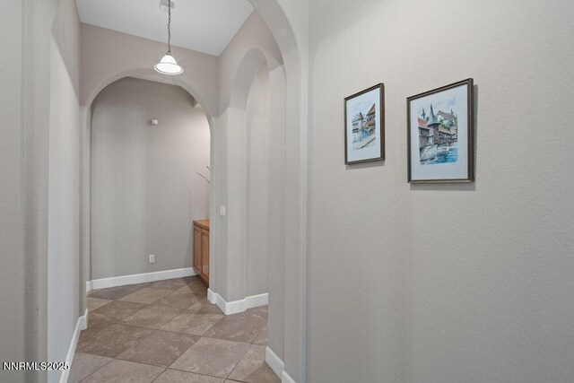 10168 Via Fiori, Reno, NV 89511 - corridor featuring baseboards and arched walkways