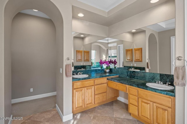 10168 Via Fiori, Reno, NV 89511 - bathroom with double vanity, baseboards, and recessed lighting