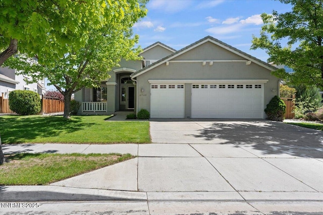 6740 Cinnamon Dr, Sparks, NV 89436 - view of front facade featuring an attached garage, concrete driveway, and stucco siding