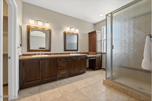 6740 Cinnamon Dr, Sparks, NV 89436 - full bath featuring a stall shower, double vanity, and tile patterned flooring