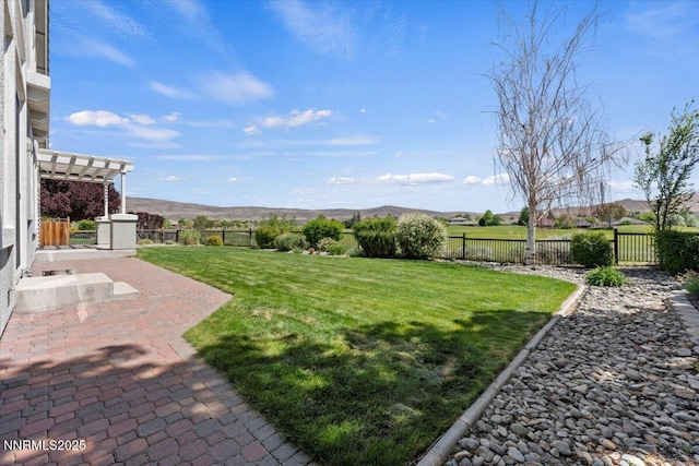 6740 Cinnamon Dr, Sparks, NV 89436 - view of yard with a patio area, a pergola, and a mountain view