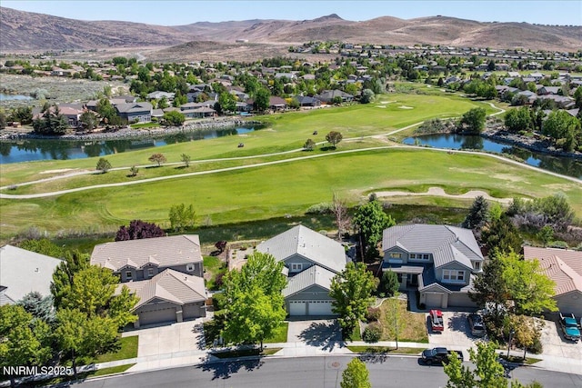 6740 Cinnamon Dr, Sparks, NV 89436 - aerial perspective of suburban area featuring a local golf course and a water and mountain view