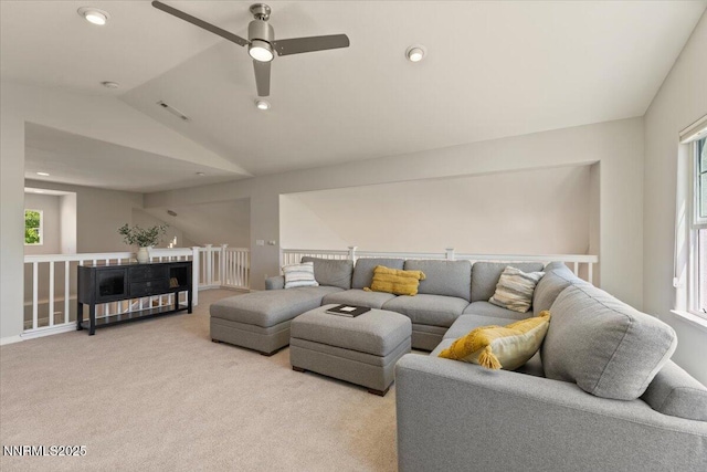 6740 Cinnamon Dr, Sparks, NV 89436 - carpeted living room featuring healthy amount of natural light, vaulted ceiling, a ceiling fan, and recessed lighting