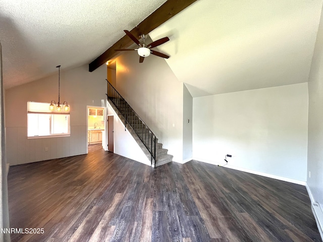 1702 London Cir, Sparks, NV 89431 - unfurnished living room with a ceiling fan, wood finished floors, stairway, a sink, and a chandelier