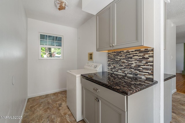 201 N Carson Meadow Dr, Carson City, NV 89701 - laundry area featuring cabinet space, hookup for a washing machine, baseboards, and a textured ceiling