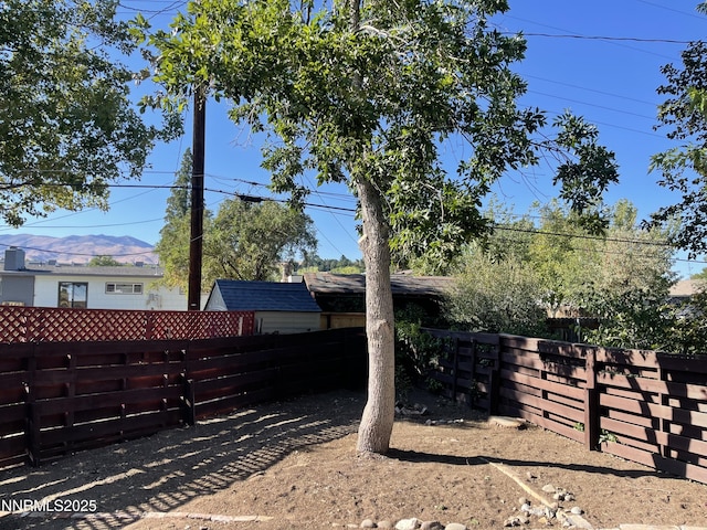2485 Riviera St, Reno, NV 89509 - view of home's exterior with a fenced backyard and a mountain view