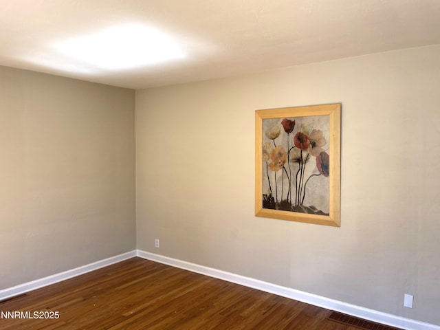 2485 Riviera St, Reno, NV 89509 - unfurnished room featuring baseboards and dark wood-style floors