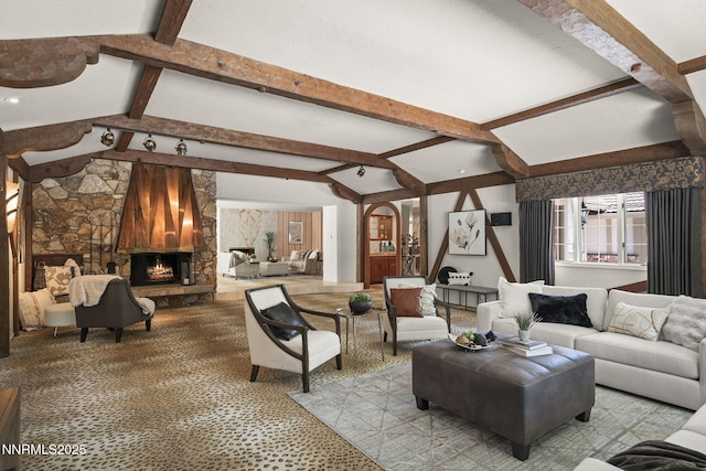 5101 Eldorado Dr, Reno, NV 89519 - living area featuring a stone fireplace and arched walkways