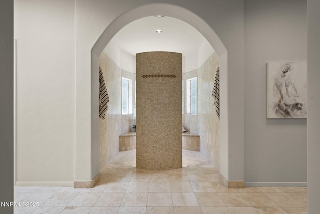 5101 Eldorado Dr, Reno, NV 89519 - hall with arched walkways and tile patterned floors