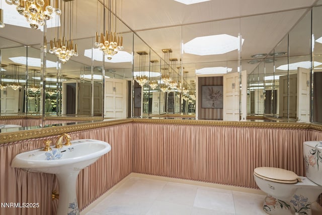 5101 Eldorado Dr, Reno, NV 89519 - bathroom with a chandelier and toilet