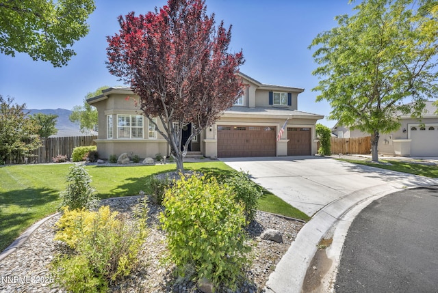 212 Portrush Ct, Dayton, NV 89403 - view of front of home with an attached garage, concrete driveway, and stucco siding