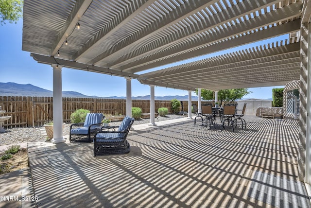 212 Portrush Ct, Dayton, NV 89403 - fenced backyard featuring a pergola, a patio area, and outdoor dining area