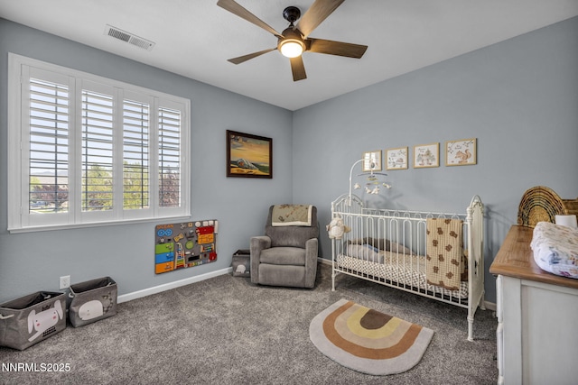 212 Portrush Ct, Dayton, NV 89403 - carpeted bedroom featuring baseboards, a nursery area, and ceiling fan