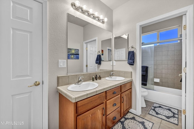 212 Portrush Ct, Dayton, NV 89403 - full bath with double vanity, toilet, shower / tub combination, and tile patterned flooring