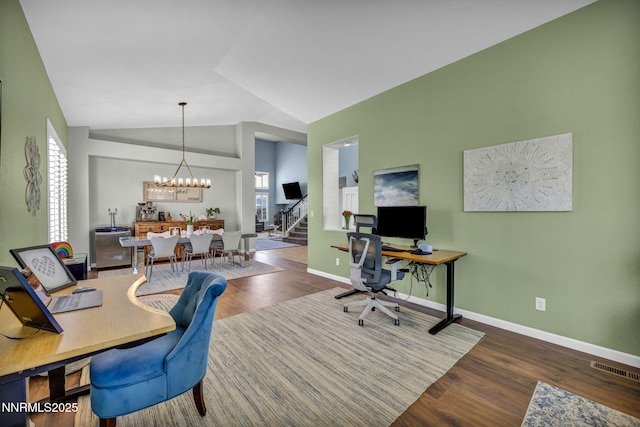 212 Portrush Ct, Dayton, NV 89403 - office space with a chandelier, wood finished floors, lofted ceiling, and baseboards