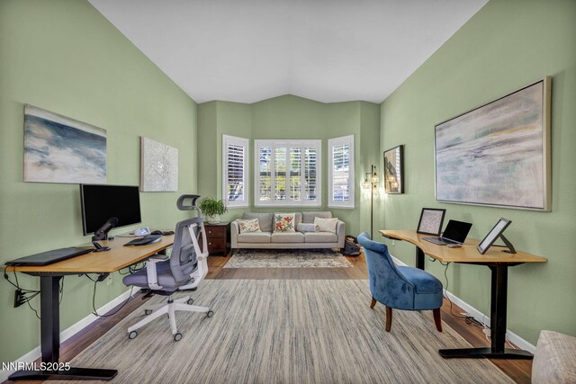212 Portrush Ct, Dayton, NV 89403 - office space featuring baseboards, wood finished floors, and vaulted ceiling