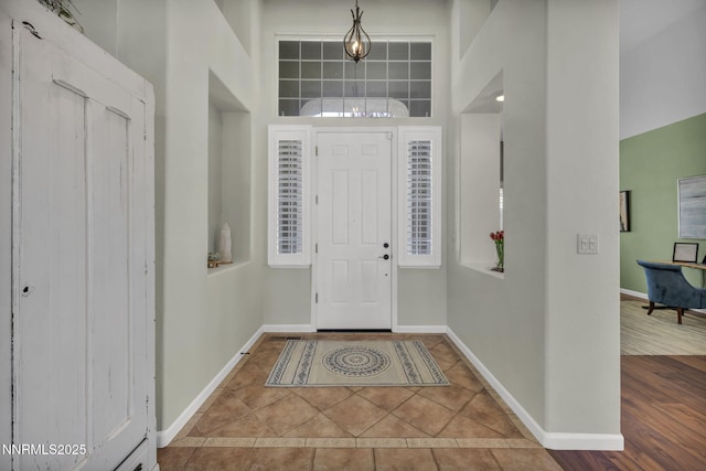 212 Portrush Ct, Dayton, NV 89403 - foyer with a high ceiling, baseboards, and tile patterned floors
