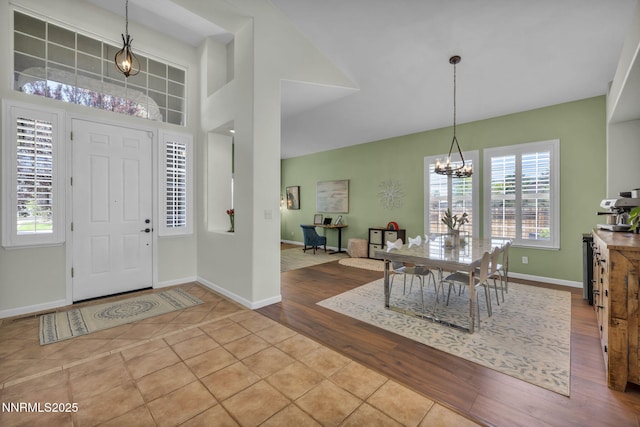 212 Portrush Ct, Dayton, NV 89403 - foyer with a chandelier, wood finished floors, and baseboards