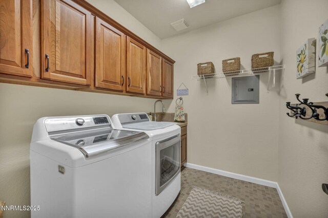 212 Portrush Ct, Dayton, NV 89403 - laundry area featuring separate washer and dryer, cabinet space, baseboards, electric panel, and tile patterned floors