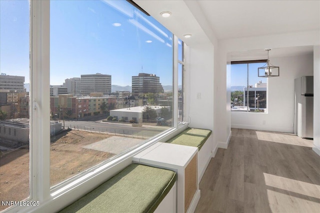 280 Island Ave Apt 906, Reno, NV 89501 - corridor with wood finished floors and a view of city