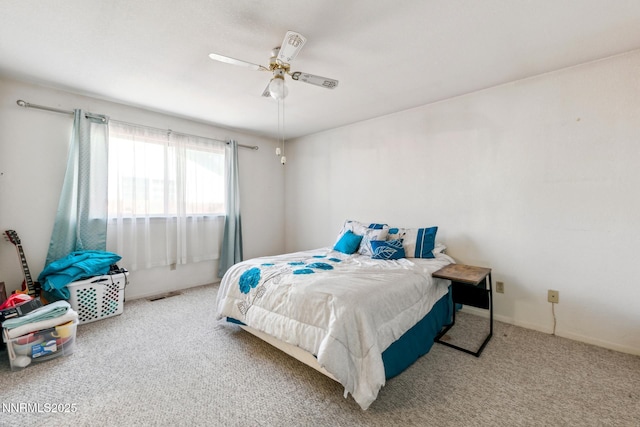 1341 Leonard Rd, Gardnerville, NV 89460 - carpeted bedroom with a ceiling fan and baseboards