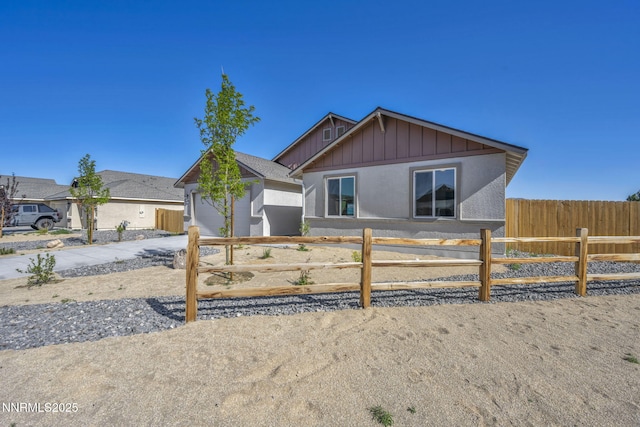 6776 Shell Ct Lot 51, Fernley, NV 89408 - ranch-style house featuring board and batten siding, driveway, and a garage