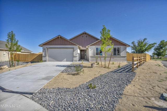 6776 Shell Ct Lot 51, Fernley, NV 89408 - single story home with a garage, concrete driveway, and board and batten siding