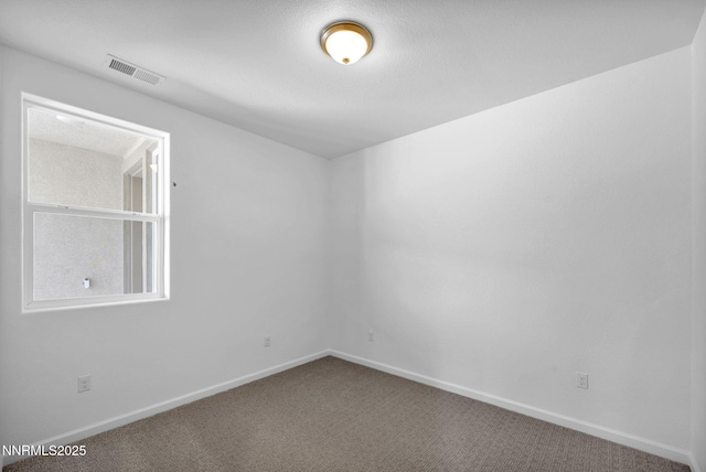 6776 Shell Ct Lot 51, Fernley, NV 89408 - empty room featuring carpet floors and baseboards