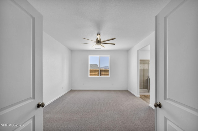 6776 Shell Ct Lot 51, Fernley, NV 89408 - spare room featuring a ceiling fan, carpet, baseboards, and a textured ceiling