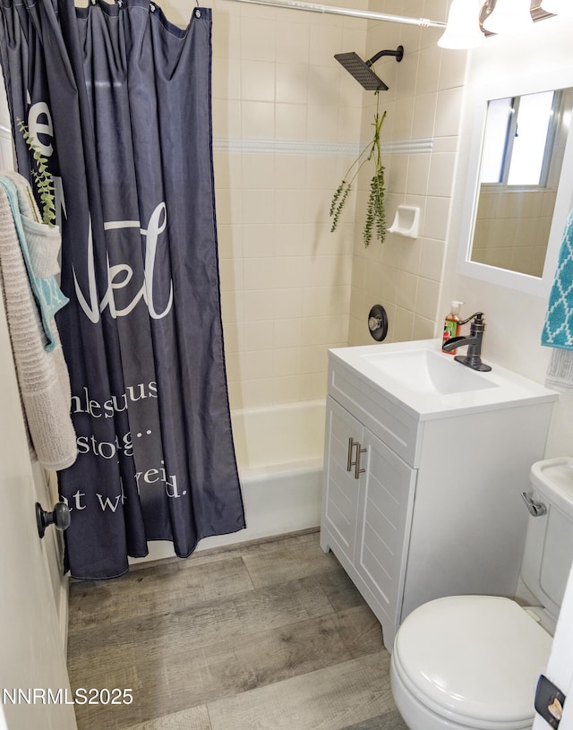 1570 Radclife Dr, Reno, NV 89502 - bathroom with toilet, shower / bath combo, vanity, and wood finished floors