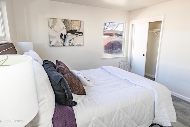 1570 Radclife Dr, Reno, NV 89502 - bedroom with wood finished floors, baseboards, and a closet