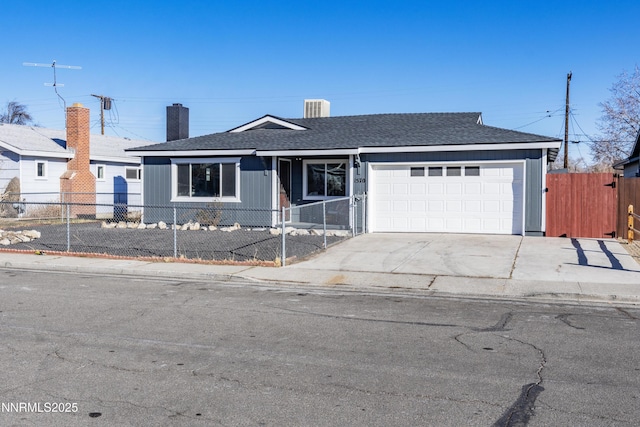 1570 Radclife Dr, Reno, NV 89502 - single story home with an attached garage, concrete driveway, and a chimney
