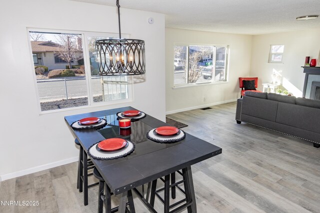 1570 Radclife Dr, Reno, NV 89502 - dining area with wood finished floors and baseboards