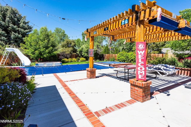 2080 St George Way, Carson City, NV 89703 - view of pool with a swimming pool, a pergola, a patio area, and a water slide